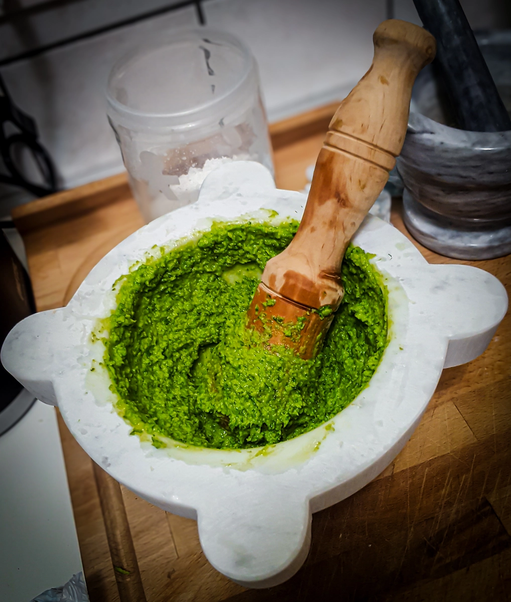 Fresh pesto in marble mortar — The Wild Nest kitchen, Ferrara