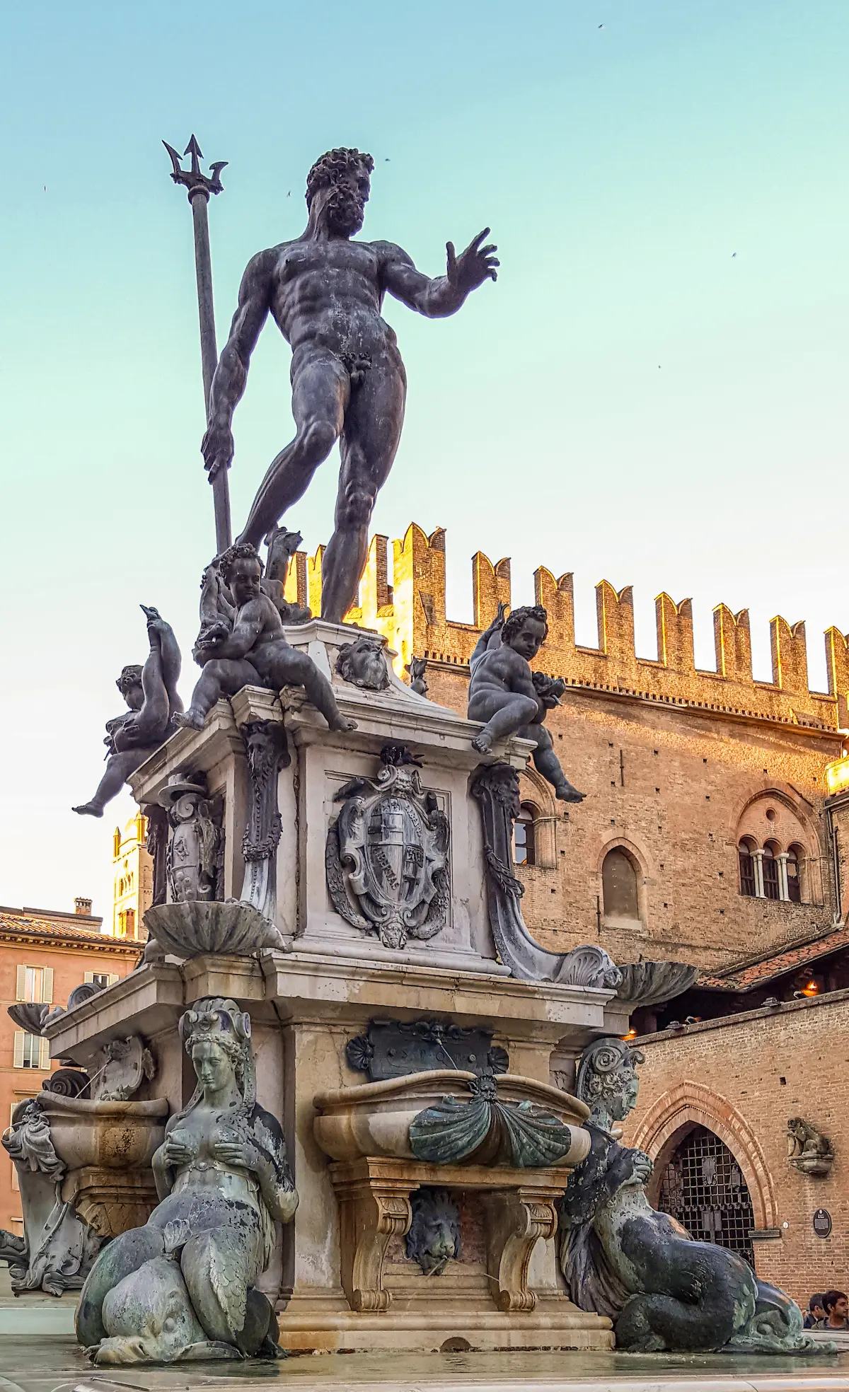 Bologna Neptune fountain, Piazza Maggiore at sunset