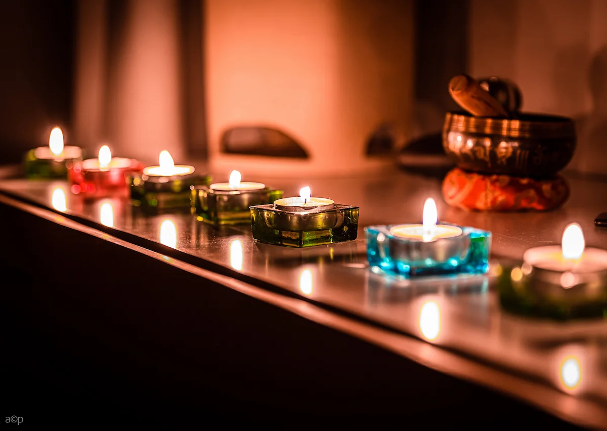 Coloured candles and Tibetan singing bowl — The Wild Nest, Ferrara