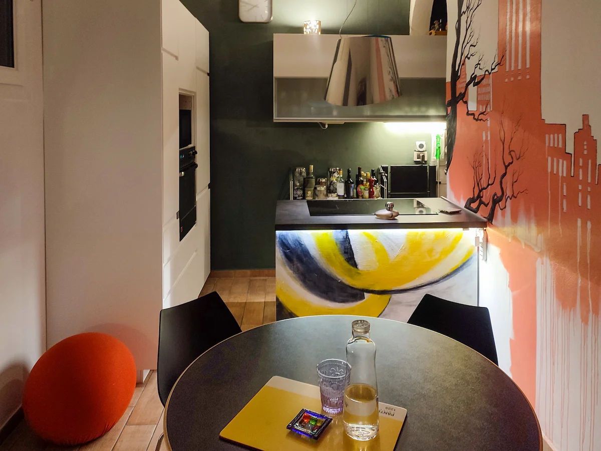 Kitchen with painted wall mural — The Wild Nest, Ferrara